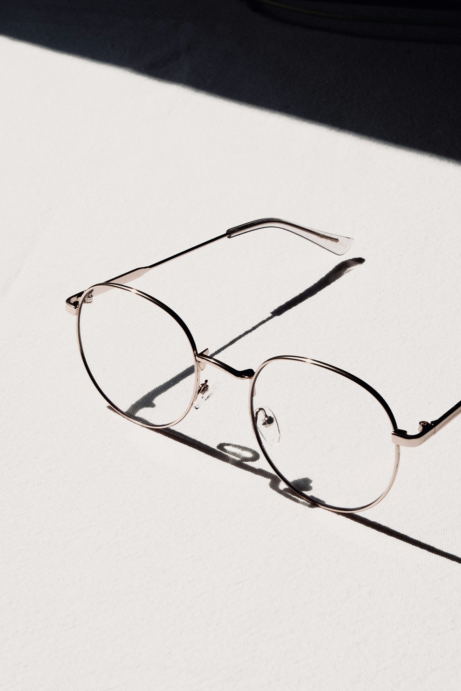 Clean, smudge-free eyeglasses with spotless lenses resting in sunlight