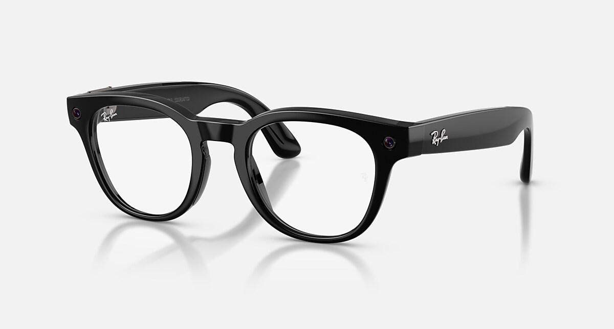 Ray-Ban Meta Scriber Optics Gen 2 AI glasses in shiny black with a rounded prescription-friendly frame, showing the built-in camera lens